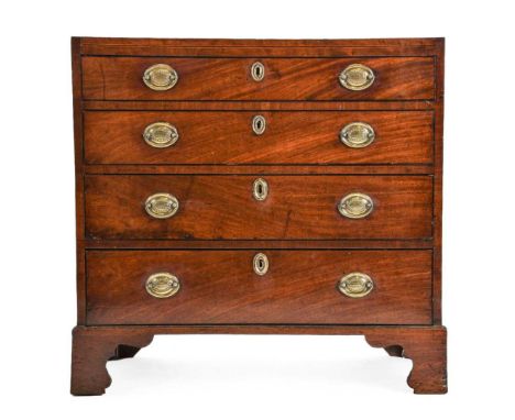 A George III Mahogany and Pine-Lined Bachelor's Chest, Late 18th century, the boxwood and ebony strung frieze above four long