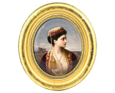 A KPM Berlin Porcelain Plaque, mid 19th century, of oval form, painted with a bust portrait of a girl in Turkish costume in l