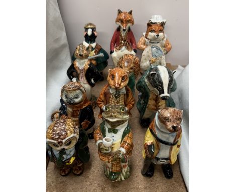 A collection of Cinque Ports Rye pottery Wind in the Willows figures including  Mr Toad, otter, owl, foxes, badger, squirrel 