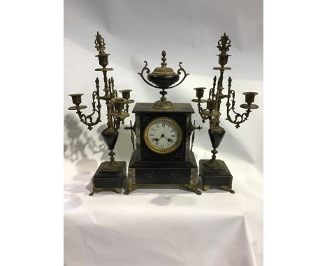 A late 19th early 20th century French slate and marble mantle clock and garniture.  Movement stamped Leforestier Paris, the c