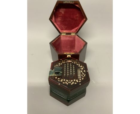 An early 20th century rosewood hexagonal accordion by RJ Ward and Son ,Liverpool. In original velvet lined rosewood box. W:21