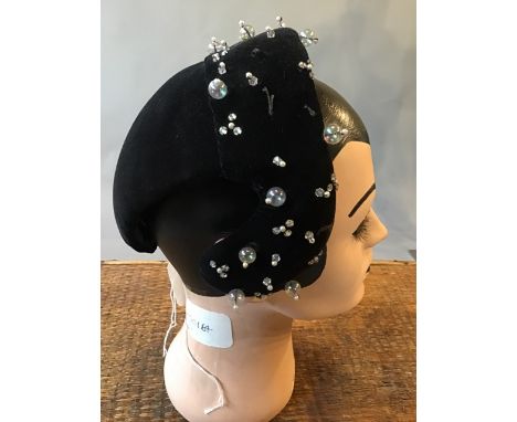 Vintage Mannequin head together with a 1950s beaded cocktail hat