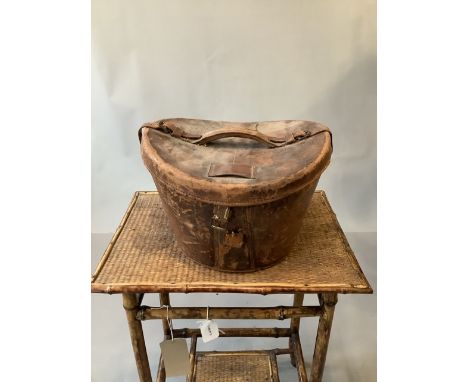 Vintage leather top hat box with silk top hat