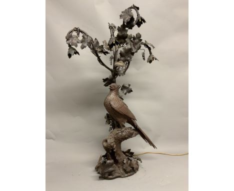 A large bronzed metal four branch floor standing lamp W:56cm x D:25cm x H:106cm