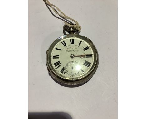 A sterling silver key wound pocket watch, white enamel dial with Roman numeral markers, subsidiary dial at 6 marked 'The Perf