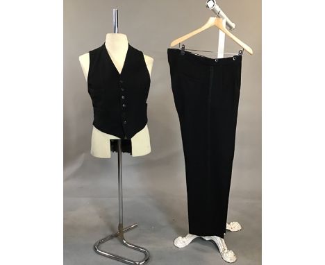 Vintage 1960s wool dinner trousers together with a 1952 dated wool 4 pocket waistcoat by Gieves. Trousers button fly 36 waist