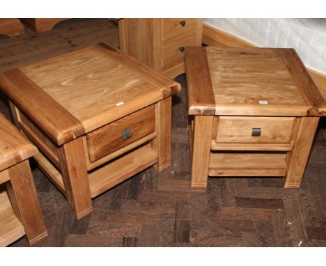 Pair of square light oak lamp tables, each fitted drawers front and back with undershelf 60cm square 