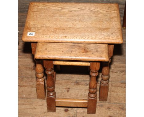 Nest of 2 reproduction heavy light oak coffee tables 
