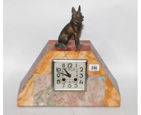 Striking mantel clock in coloured marble case with spelter Alsatian mount, by Levaigner Jacqueline 