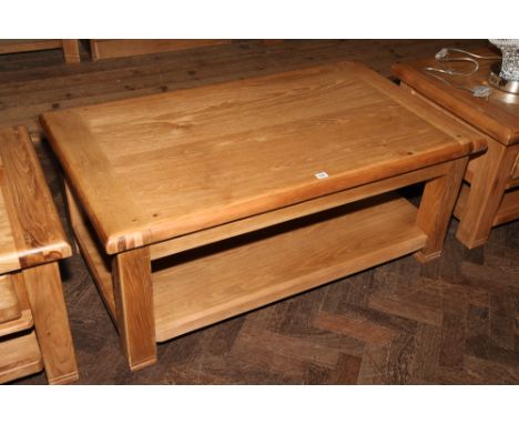 Large heavy light oak 2 tier coffee table appx 120 x 70 cm x 50cm high