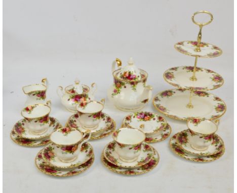 A Royal Albert "Old Country Roses" part tea service comprising teapot, three tiered cake stand, twin handled sugar bowl and c