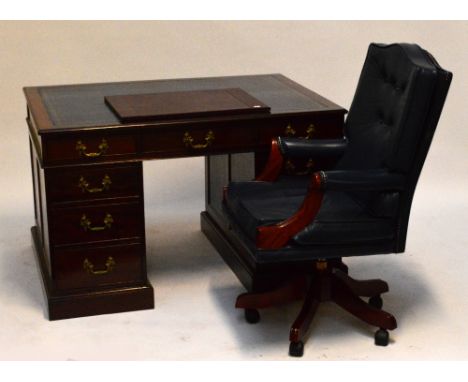 A mahogany twin pedestal desk with three drawers above three further drawers on each pedestal, with panel sides above bottom 