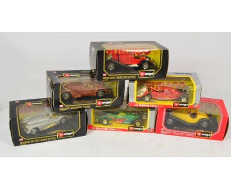 Twelve Burago 1/24 scale boxed models including Grand Prix cars, Jaguar XK120, etc, 