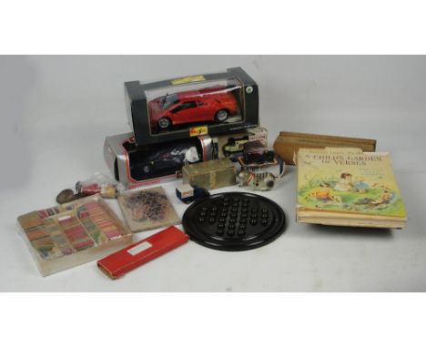 A small quantity of toys including a boxed special edition Lamborghini Diablo (1990), by Maisto, a boxed Ferrari F40 (1985) b