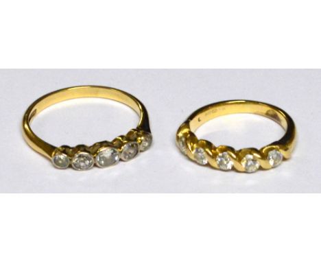 An 18ct yellow gold five stone collet set diamond ring with pierced gallery, size Q/R and an 18ct yellow gold five stone diam