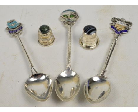 Two Elizabeth II hallmarked silver thimbles, one set with agate, David Scott Walker, Sheffield 1999, the other with gilt wash