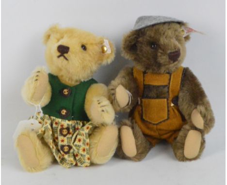 A boxed pair of Steiff Brother & Sister Austria teddy bears, no.659911, with numbered white and red tags to ears, the boy bea