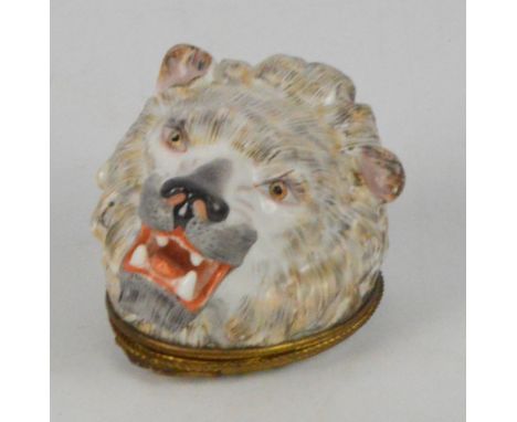 A c.1800 Ludwigsburg trinket box in the form of a lion's head with hinged oval underplaque painted with a floral spray, width