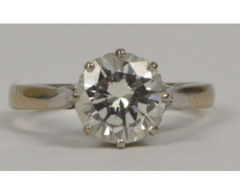 An 18ct white gold and diamond solitaire ring, the circular brilliant cut stone weighing approximately 1.75cts in pierced scr