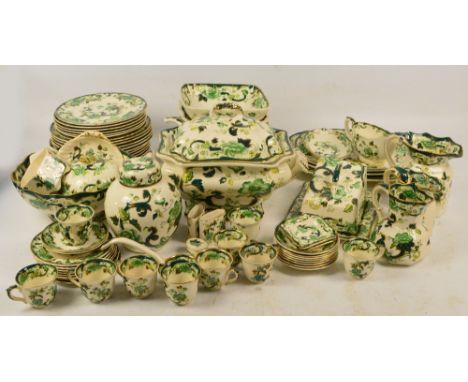 A large collection of Masons green chartreuse ceramics, some seconds, including a large tureen, cover and ladle, cheese dish 