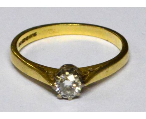 An 18ct yellow gold diamond solitaire ring, in claw setting with pierced shoulders, size O, approx 2.8g.