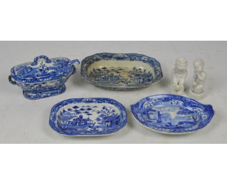 A small collection of 19th century blue and white dinnerware comprising a lidded twin handled tureen with ladle and saucer by
