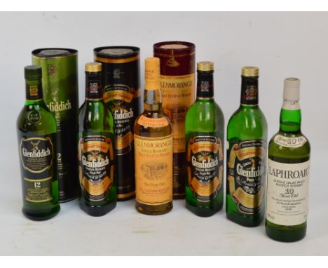 Six bottles of Scotch Whisky; 4 x Glendfiddich including 12 years example, 1 x Glenmorangie, aged 10 years and 1 x Laphroraig