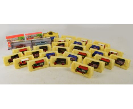 Twenty-five boxed Walker's Crisps Lledo diecast vehicles, two boxed Dinky Matchbox diecast vehicles; 1973 MGGBT and 1955 Bent