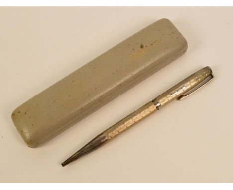 A cased Elizabeth II hallmarked silver Yard-O-Led propelling pencil with engine turned decoration, engraved "MDE" to upper pa
