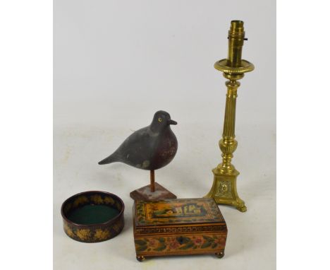 A brass Empire style table lamp, height including fittings 40.5cm, a papier mâché and gilt decorated bottle coaster, a wooden