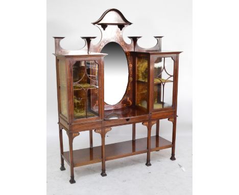 An Edwardian mahogany and inlaid Art Nouveau display cabinet by Thomas Edwards & Sons, Cabinet Makers, Newcastle, Staffs, the