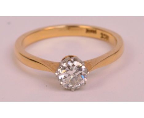 An 18ct yellow gold diamond solitaire ring, the round brilliant cut stone weighing approx 0.70cts, size N, approx 2.8g.