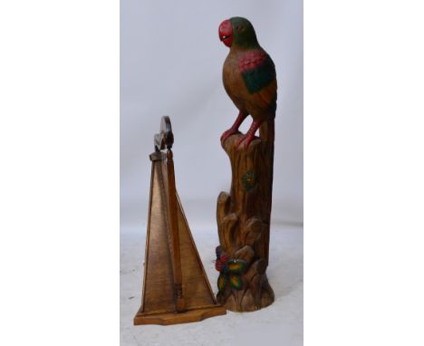 A contemporary decorative large wooden model of a parrot and a model of a harp (2). CONDITION REPORT: Parrot: height 150cm. H