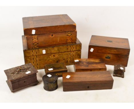 Three Victorian walnut work boxes, a rosewood glove box, a small carved trinket box, and four others (9).