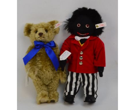 A boxed Steiff Jolly Golly & Bear set no.654428, both with numbered white and red tags to ears, Golly has red coat, striped t