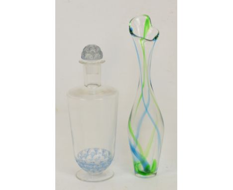 A post-1945 Lalique clear and light blue glass footed decanter of tapering form decorated with fish motifs to lower part of t