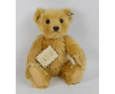 A boxed British Collectors' 1990 Steiff teddy bear no.406096, with numbered white and black tag to ear, with blonde mohair fu