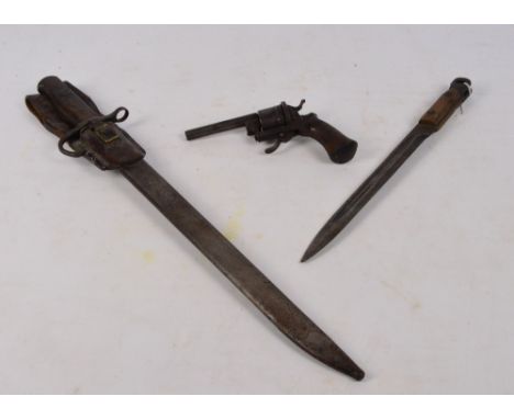 A 19th century Belgian pinfire revolver with walnut butt, length 18cm, an early 20th century bayonet in scabbard and a furthe