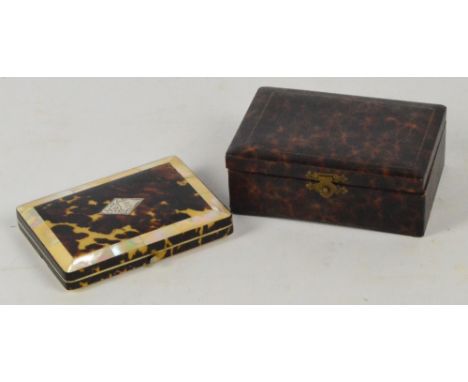 A tortoiseshell and mother of pearl card case with silver lozenge shaped inset bearing initialled cartouche, with hinged side