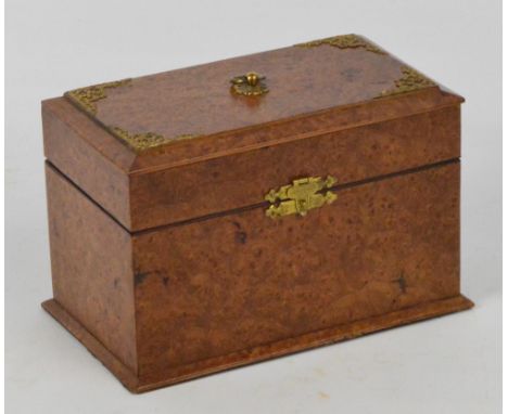 A 19th century burr walnut perfume casket with pierced gilt metal mountings and small central handle, the hinged lid enclosin