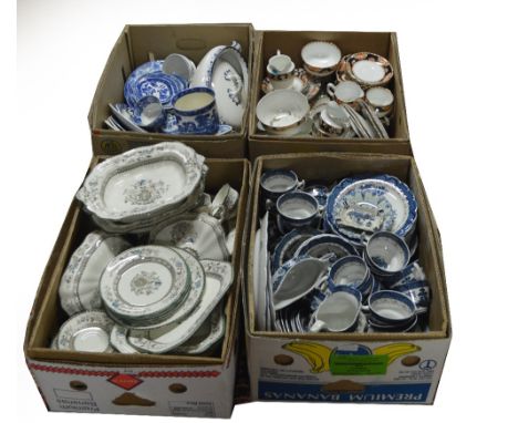 Four boxes of dinner and tea ware including Copeland Spode "Chinese Rose" (colours faded), blue and white willow pattern, Roy