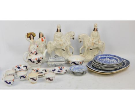 A collection of 19th century blue and white dinner ware including two large platters, a Gaudy Welsh Tart tea service, a pair 