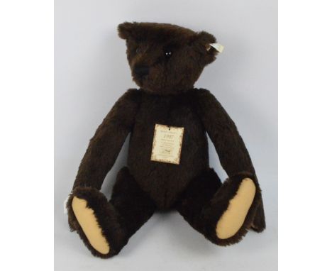 A boxed British Collectors' 1993 Steiff teddy bear no.406065, with numbered white and black tag to ear, with chocolate brown 