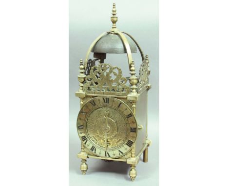 BRASS LANTERN CLOCK, late 17th century and later, with 6 1/4" chapter ring, alarm dial and single hand beneath a pierced gall