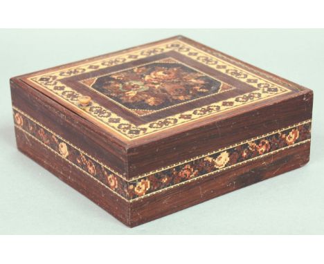 TUNBRIDGEWARE BOX, of square form with hinged cover, a central floral panel inside a rosewood and geometric border, height 5.