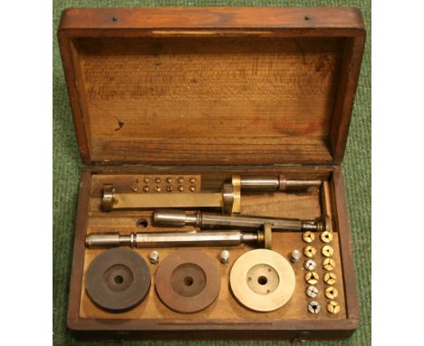 CASED SET OF LAPING TOOLS for polishing pocket watch screw heads.