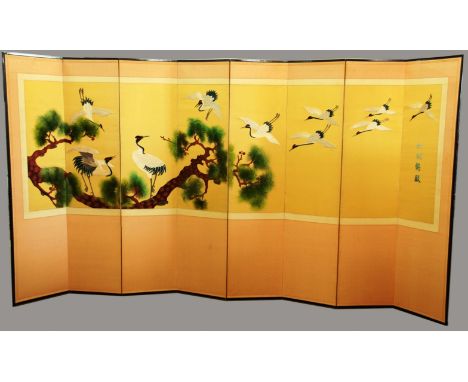JAPANESE EIGHT FOLD SCREEN, 20th century, the front with a silkwork scene of cranes amongst pine trees, the reverse with pane