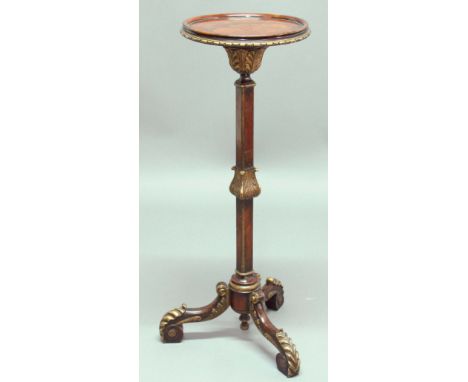 GEORGE II STYLE WALNUT AND GILT TORCHERE, with circular tray top, square section column and tripod base, the whole with gilt 