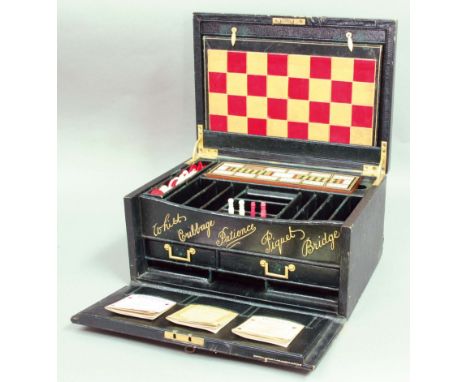 LEATHER BOUND GAMES COMPENDIUM,  the interior with gilt lettering and highlights fitted with drawers and compartments, cribba