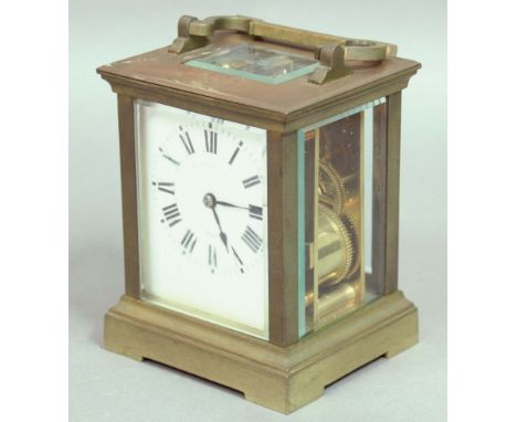 FRENCH BRASS FOUR PANE CARRIAGE CLOCK, the enamelled dial inscribed 'Elkington and Co, with an eight day half hourly striking